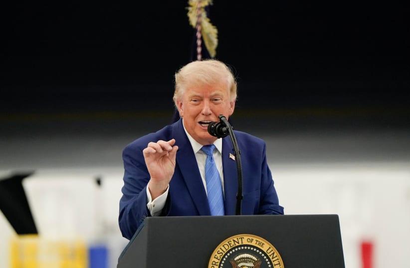 US President Donald Trump delivers a speech as he stands in front of the VC-25B aircraft gifted by Qatar that will be used as Air Force One, at Joint Base Andrews, Maryland, US, June 19, 2026. 