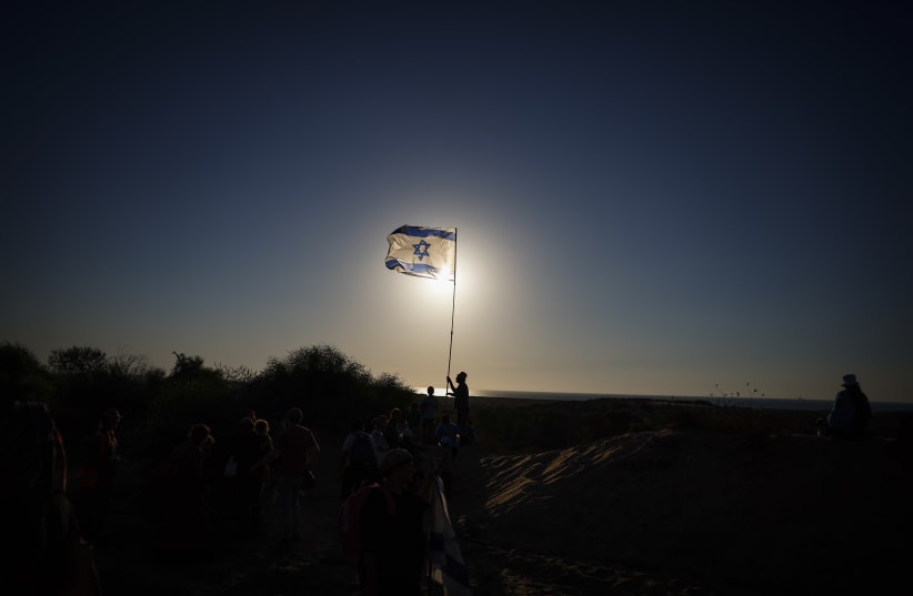 Jews who support the re-establishment of Israeli settlements in the Gaza Strip march near the Israeli border with Gaza, in southern Israel, July 19, 2026