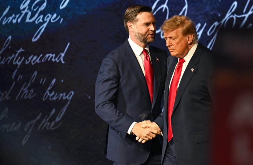 US Vice President JD Vance (L) welcomes US President Donald Trump to the stage on the second day of the 2026 Republican National Convention at the American Airlines Center on September 10, 2026 in Dallas, Texas.