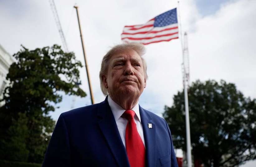 US President Donald Trump looks on while he speaks to reporters as he departs the White House for Joint Base Andrews en route to Dalton, Georgia, on the South Lawn of the White House in Washington, DC, US, October 16, 2026.  (photo credit: REUTERS/Evan Vucci)