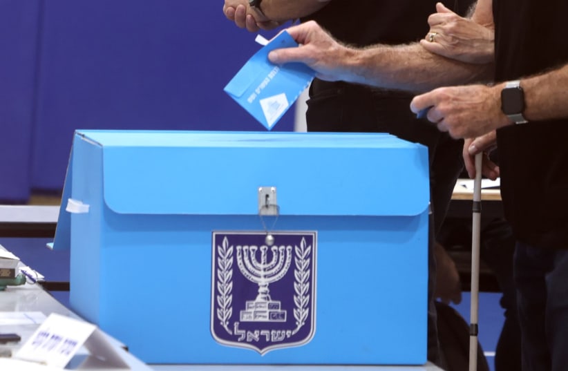 An Israeli casts a vote during general elections in Jerusalem on October 27, 2026.