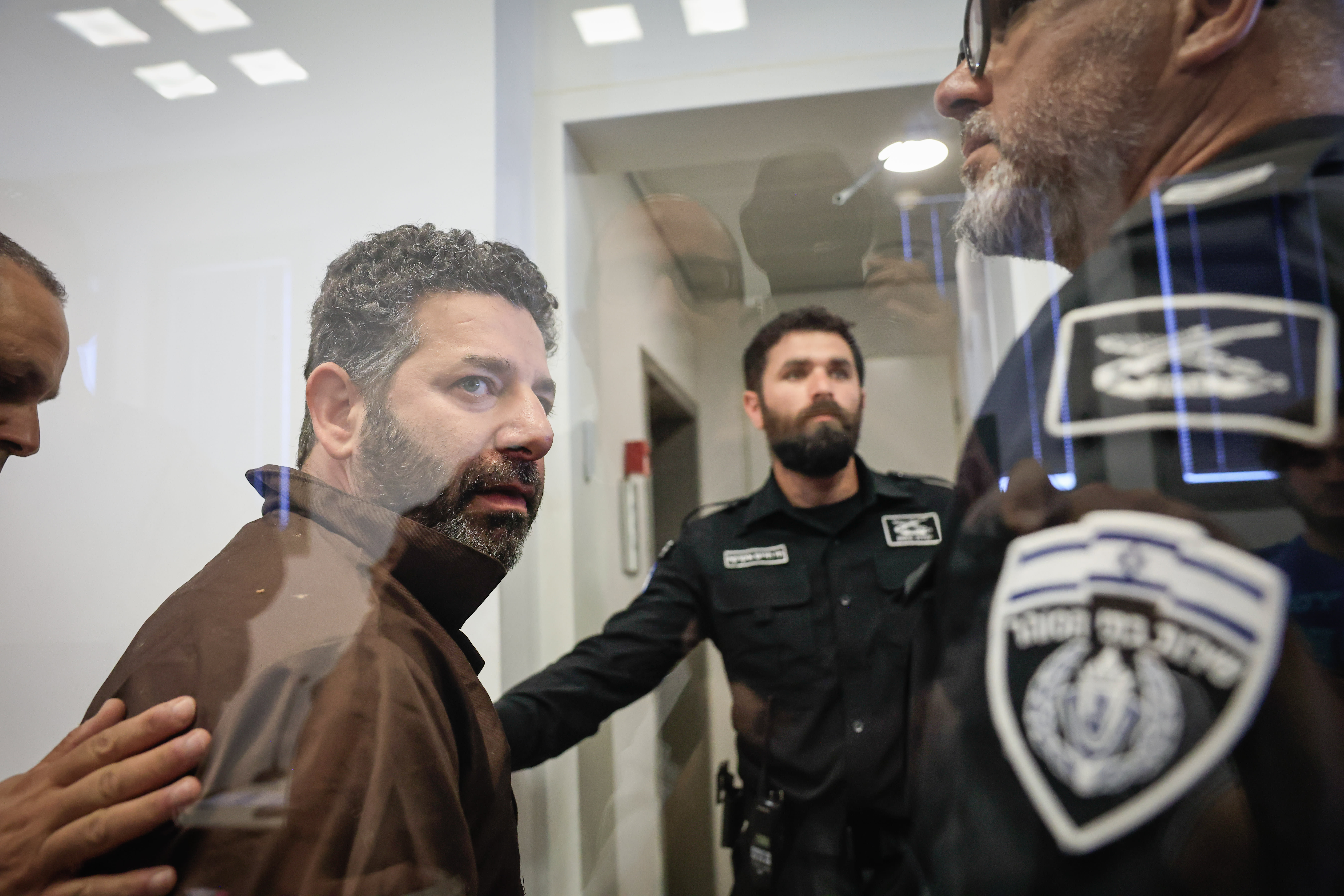 Saif Abu Keshek, who took part in a flotilla to the Gaza Strip, arrives for a remand hearing at the Magistrate