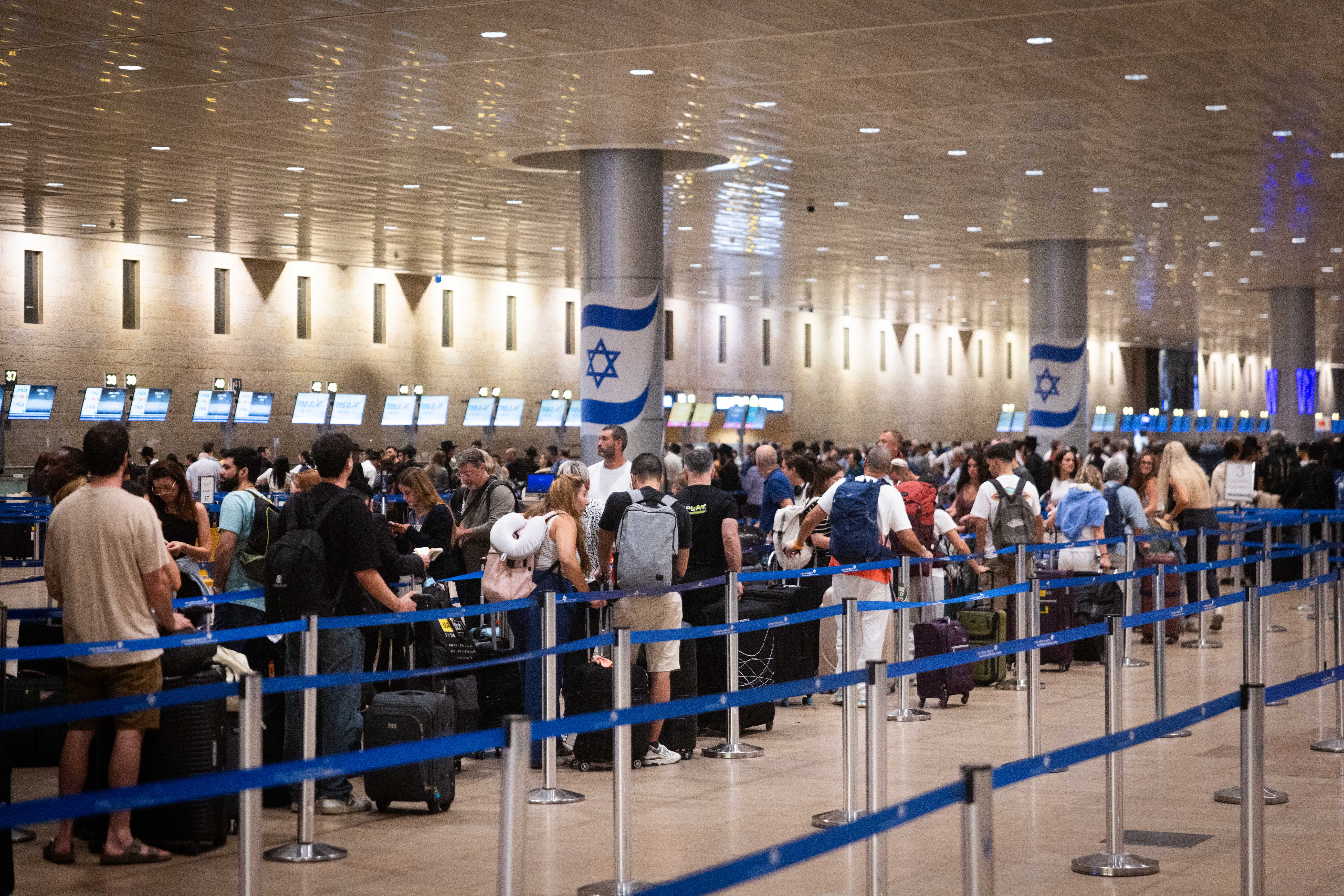 Passengers at the Ben Gurion International airport near Tel Aviv on September 18, 2025. (photo credit: Chaim Goldberg/Flash90)