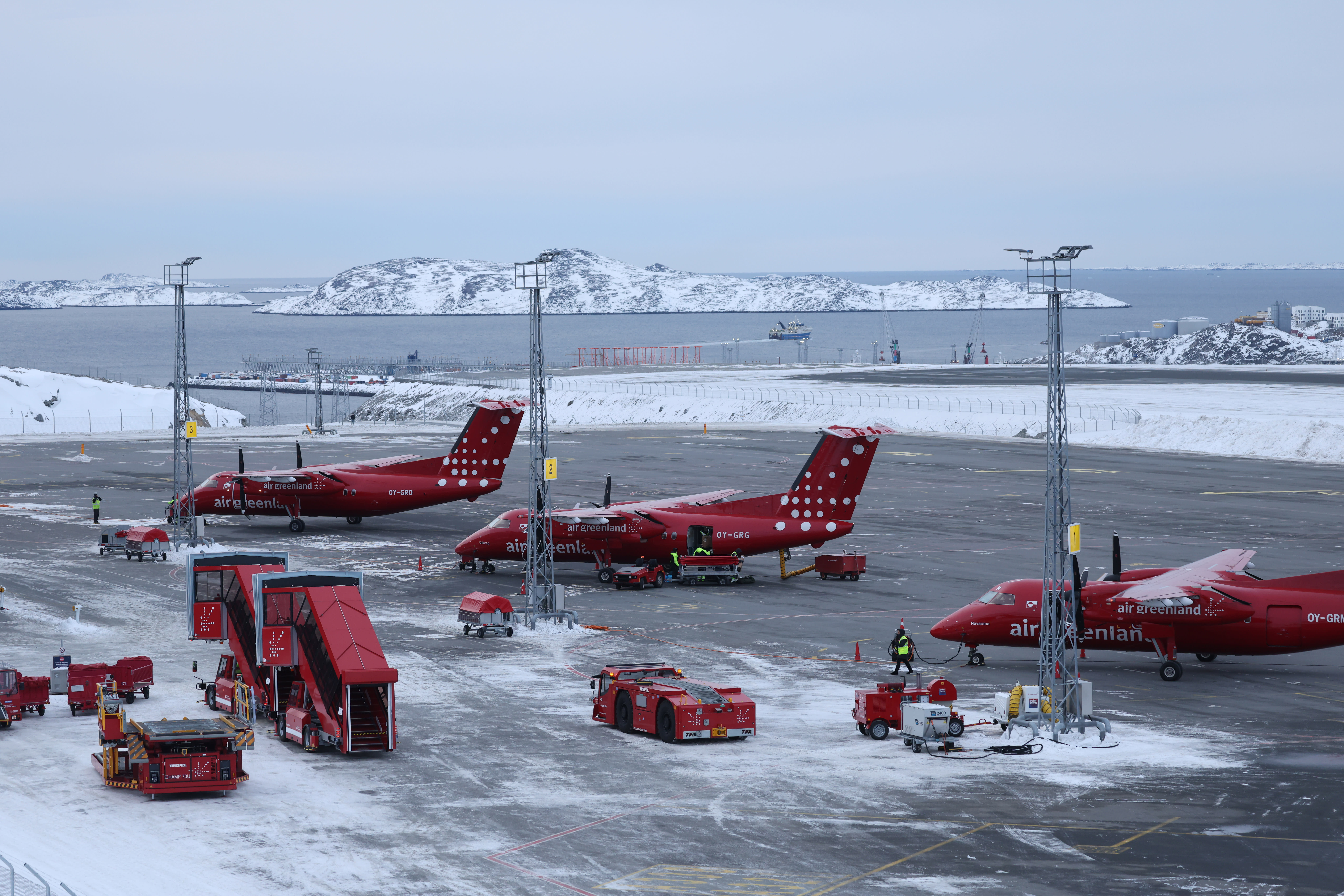 Propeller planes of Air Greenland used for regional connections stand at Nuuk Airport on January 16, 2026 in Nuuk, Greenland. (photo credit: SEAN GALLUP/GETTY IMAGES)