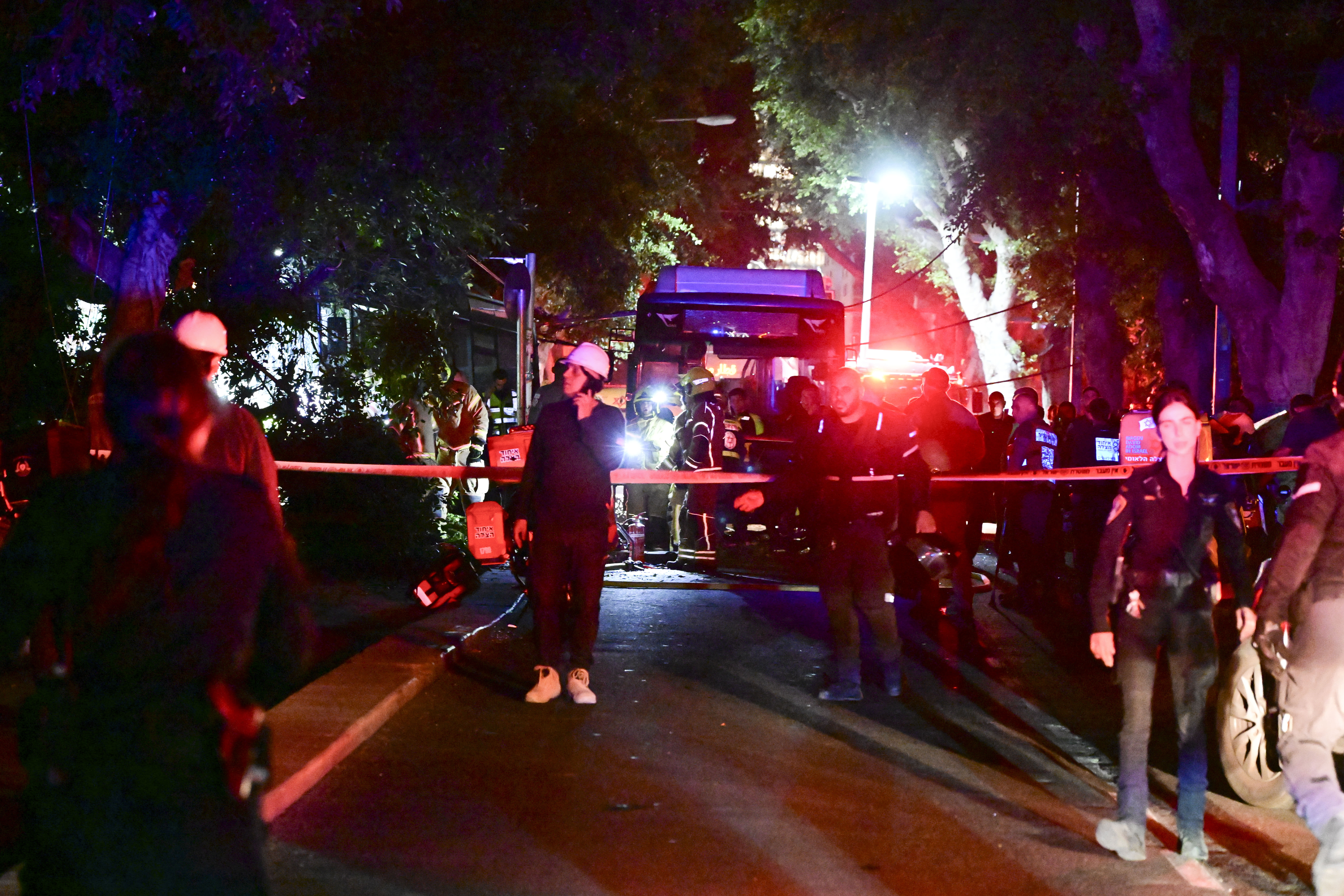 Security and rescue forces at the scene of a bus accident in central Tel Aviv, May 18, 2026. (photo credit: AVSHALOM SASSONI/FLASH90)
