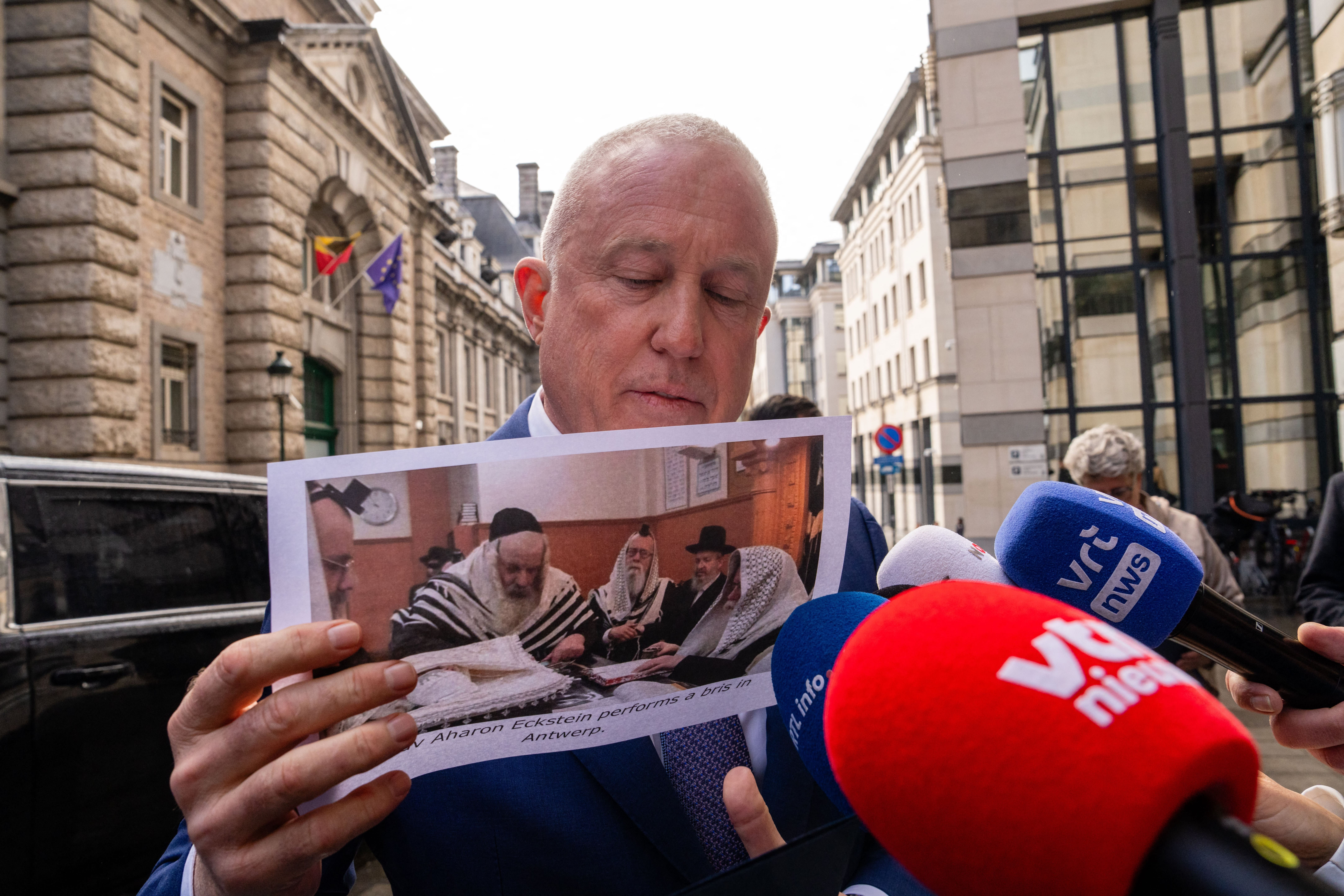 US AMBASSADOR to Belgium Bill White shows an image of a ritual circumcision, in Brussels. (photo credit: Marius Burgelman/BELGA MAG/Belga/AFP via Getty Images)