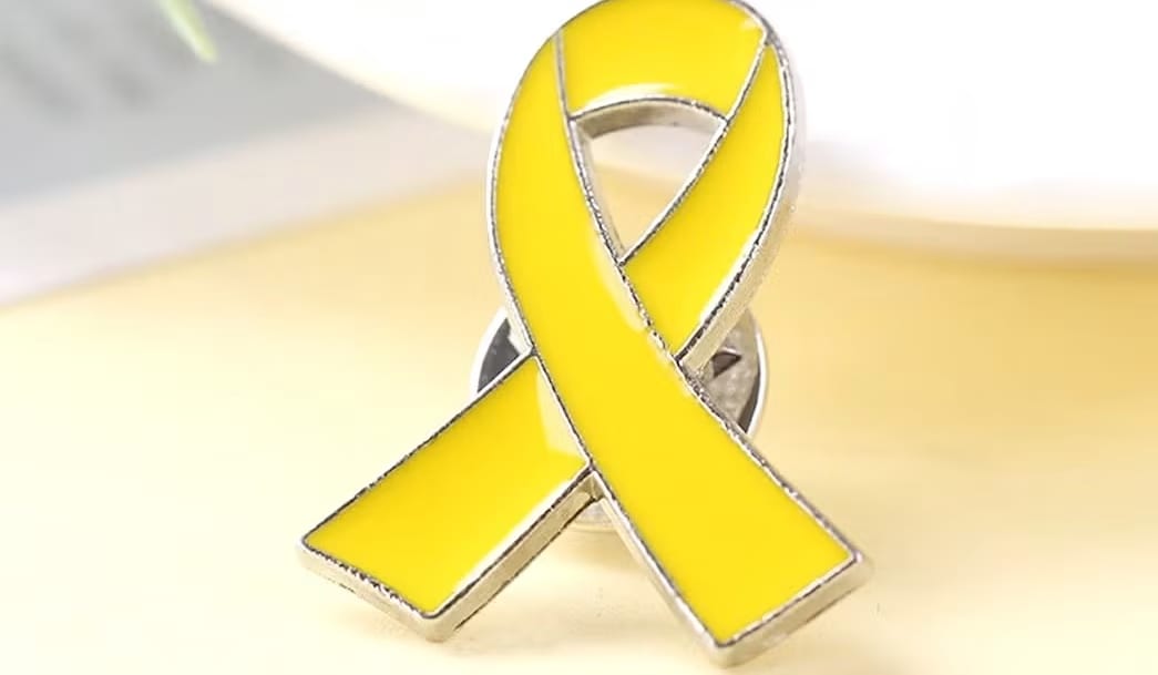 The yellow ribbon pin became a ubiquitous symbol for solidarity with the hostages held by Hamas.  (photo credit: FACEBOOK)