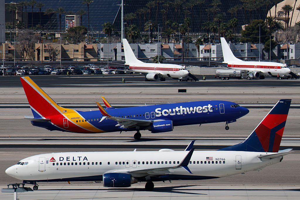 A SOUTHWEST Airlines Boeing 737 airplane departs from Harry Reid International Airport as a Delta Airlines aircraft taxis on March 11, 2026 in Las Vegas, Nevada.  (photo credit: Kevin Carter/Getty Images)