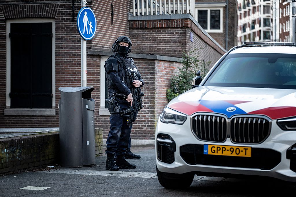 A POLICE officer stands guard in front of the Jewish Museum on Nieuwe Amstelstraat in Amsterdam on March 14, 2026.  (photo credit: Mexx VAN DER LIEUW / ANP / AFP via Getty Images)