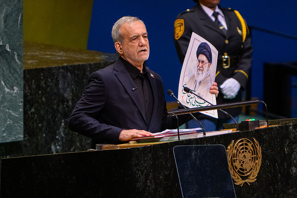President of Iran Masoud Pezeshkian holds up a poster of assassinated Supreme Leader of Iran Ali Khamenei while addressing the 81st session of the United Nations (UN) General Assembly at UN Headquarters on September 23, 2026 in New York City. (photo credit:  Alexi J. Rosenfeld/Getty Images)