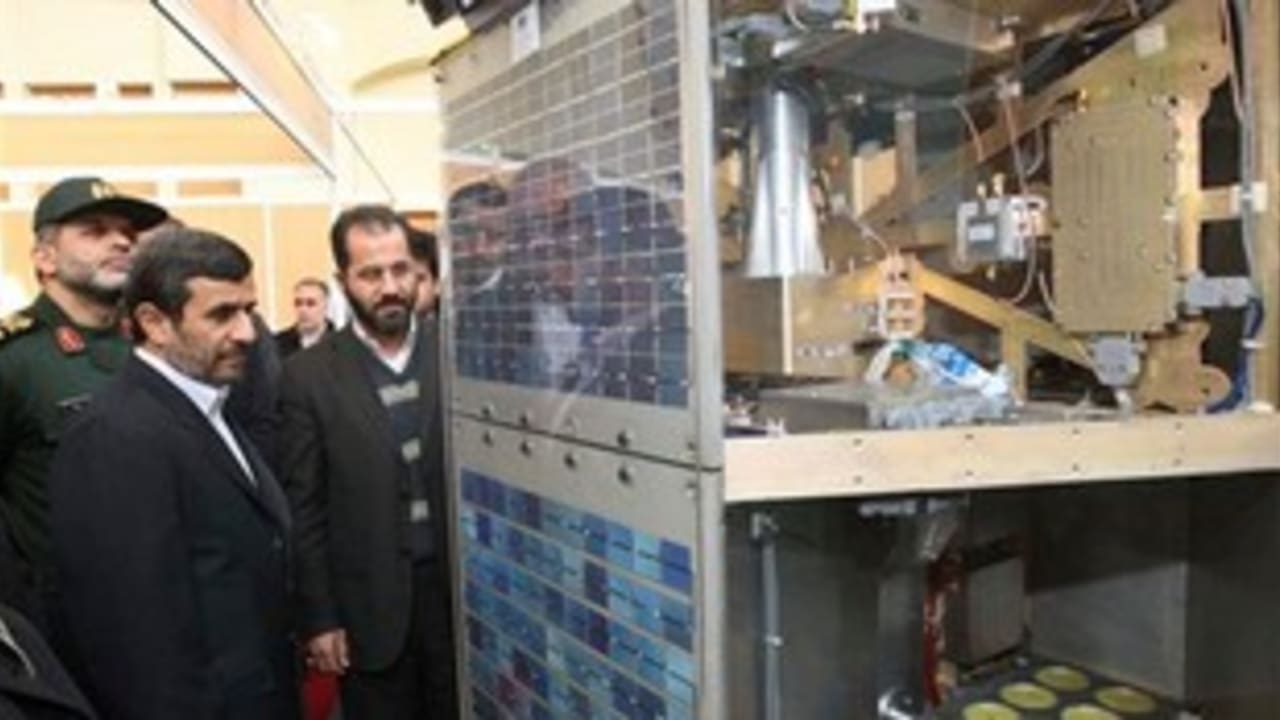 Ahmadinejad with satellites 311 AP