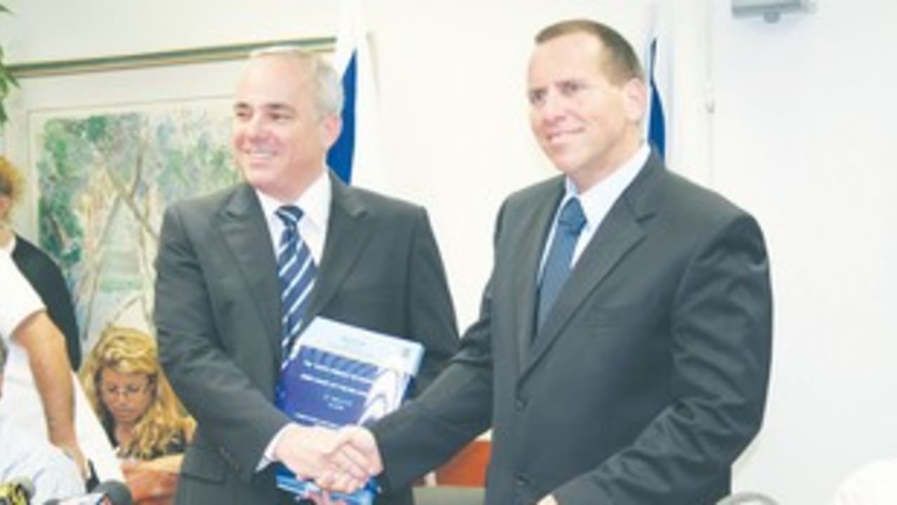 Finance Minister Yuval Steinitz and Ilan Levin 311