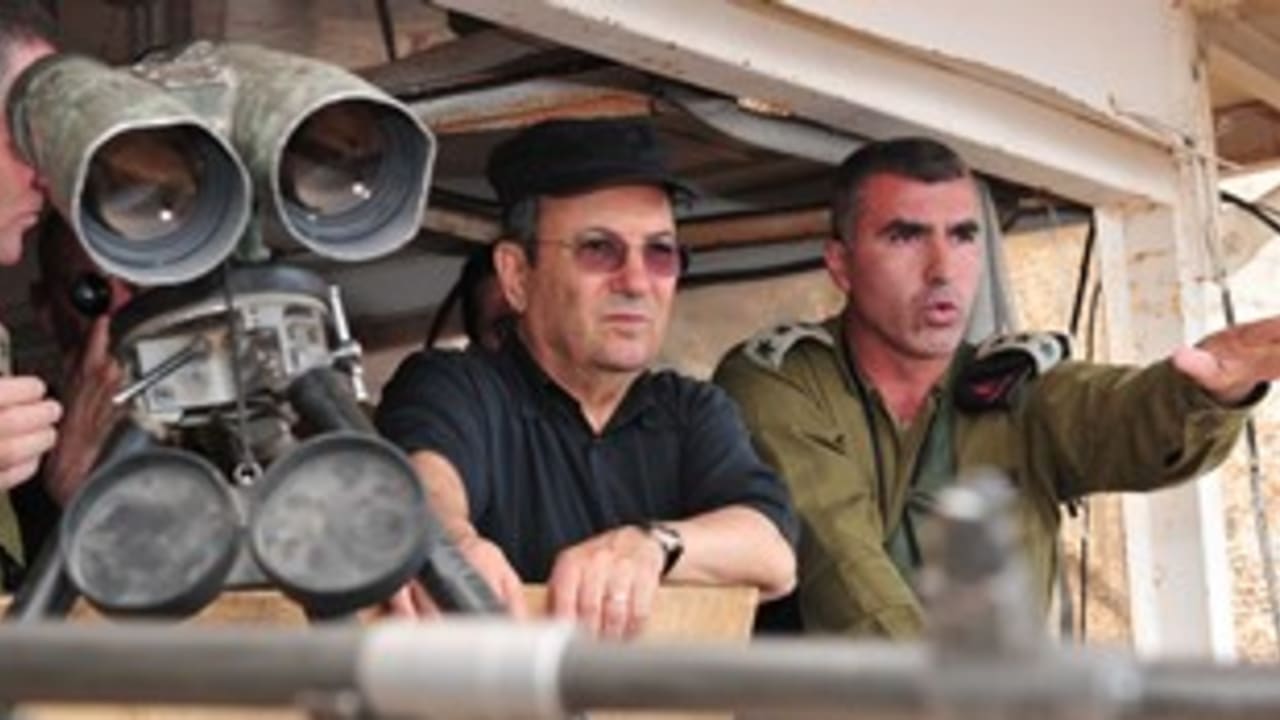 Ehud Barak surveys the scene at Syria border_311