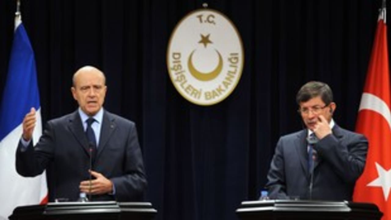 French, Turksih Foreign Ministers Juppe and Davutoglu_311