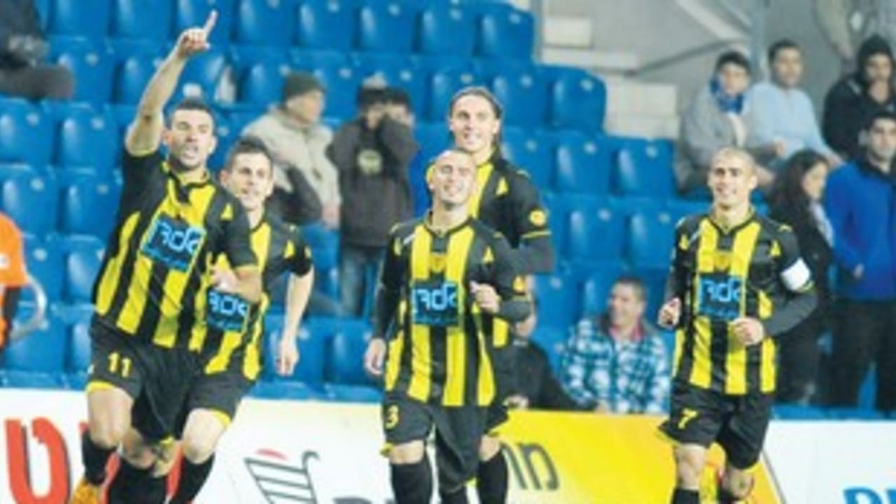 BRAZILIAN STRIKER Leonardo Passos Alves celebrates 311