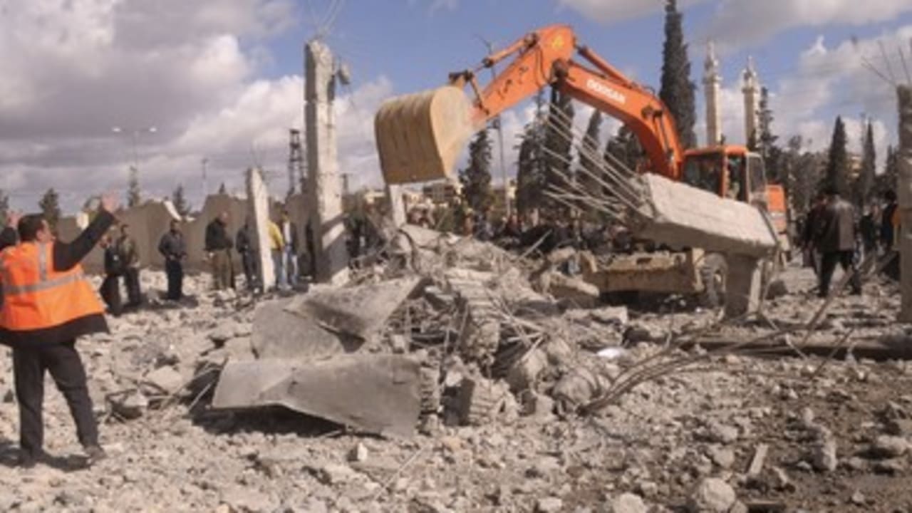 Excavator at site of Aleppo blasts 390