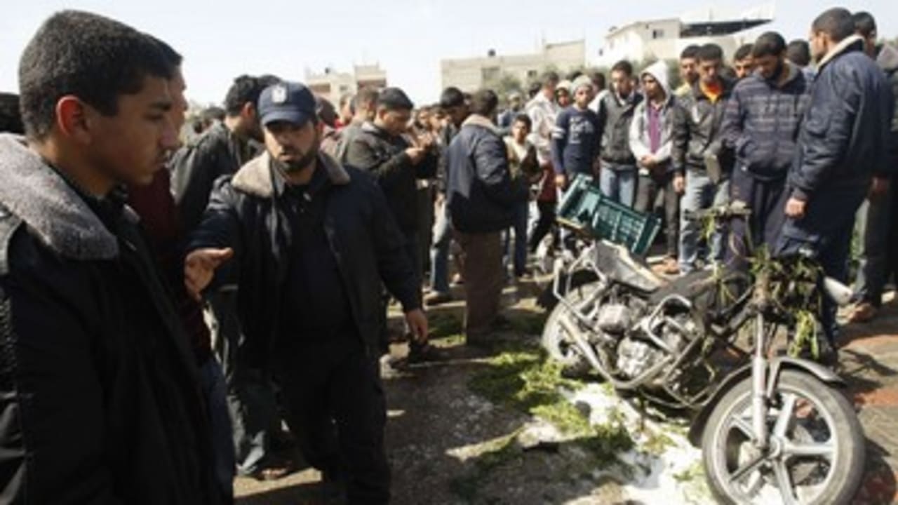 Hamas policeman near exploded motorcycle in Gaza_370