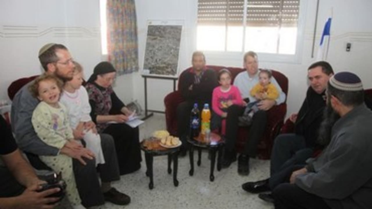 Families with Transport Minister Yisrael Katz in Hebron home