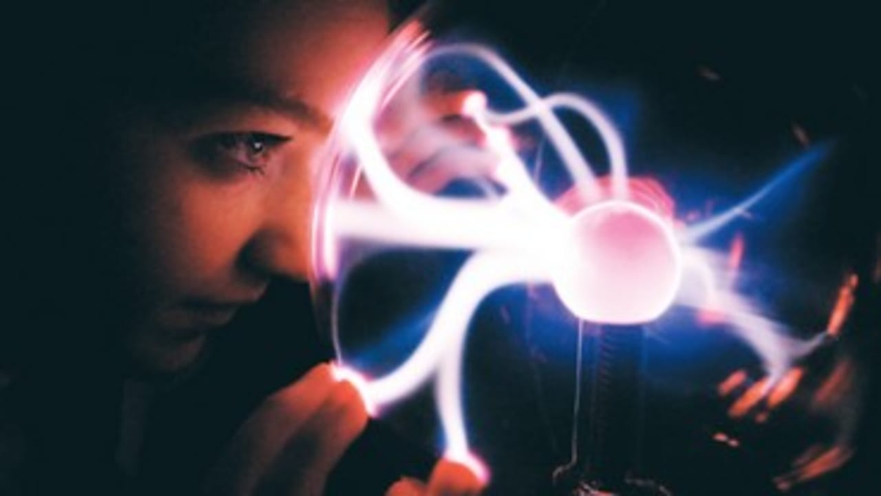 GEMMA MCINLAY looks into a plasma ball 370