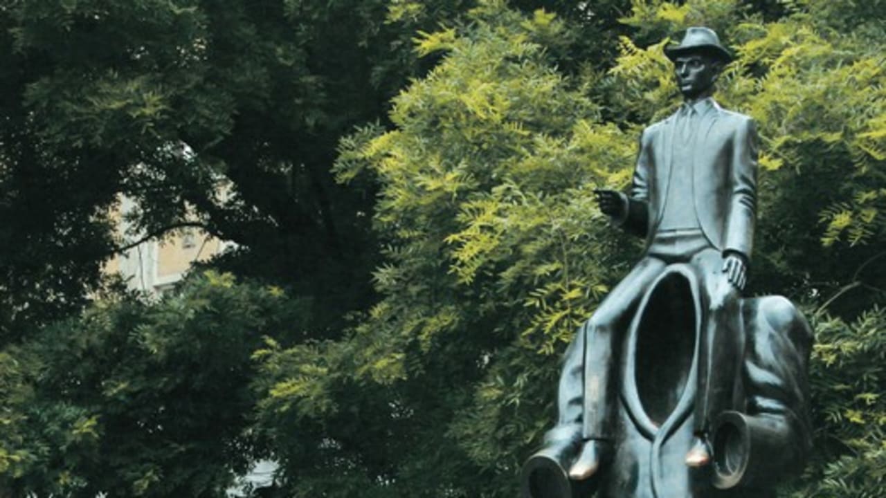 A statue of Franz Kafka in central Prague 521