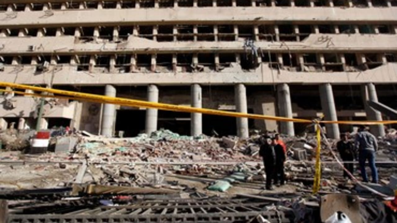 Cairo bombing destroyed building Jan 24 2014