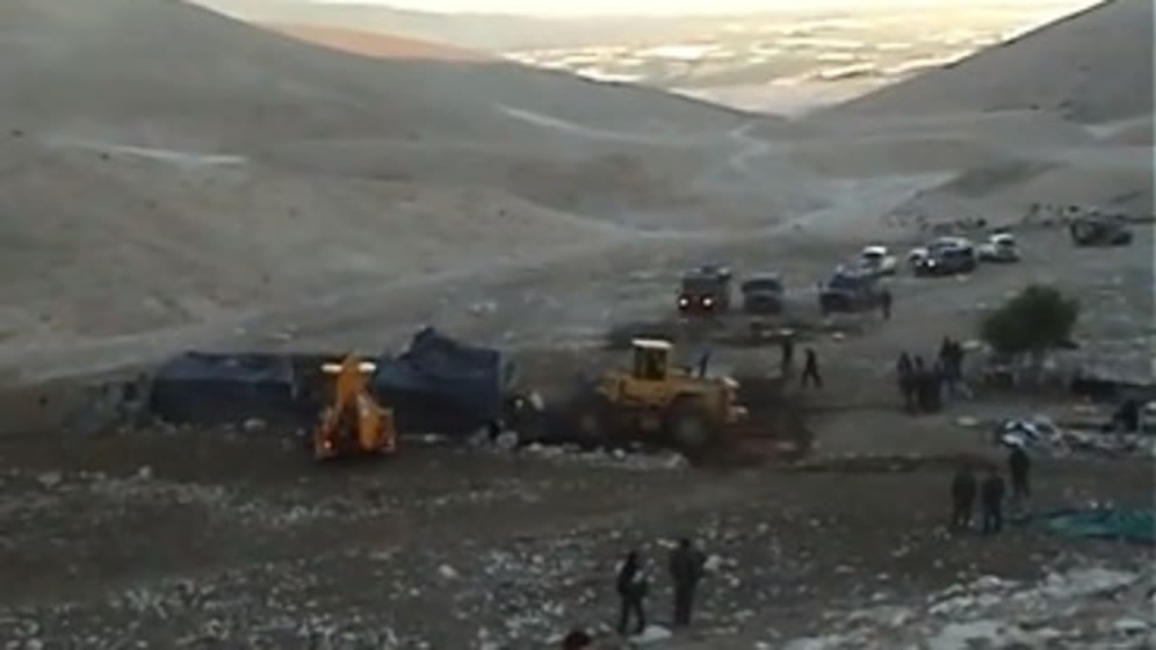 Civil Administration bulldozers destroy a tent in the Palestinian village of Khirbet 'Ein Karzaliyah in the Jordan Valley on January 8. Photo 