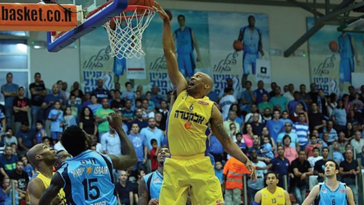 Maccabi Tel Aviv forward Devin Smith (center) had 15 points, nine rebounds and five assists in his team’s 100-96 victory at Hapoel Eilat.