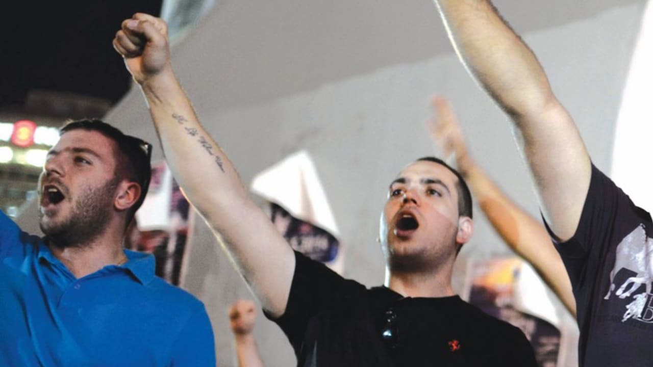 Right-wing activists protest in Tel Aviv on July 1.