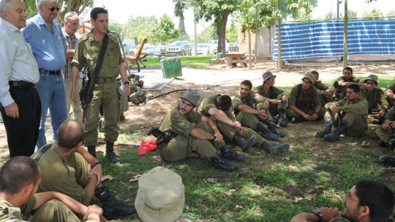 Agriculture Minister Yair Shamir speaks to soldiers in the Eshkol region during this summer’s conflict with Gaza.