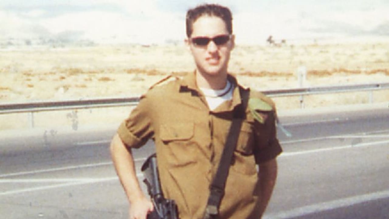 Staff-Sgt. Ari Weiss, whose 12th yahrzeit is today, wears his army uniform proudly.