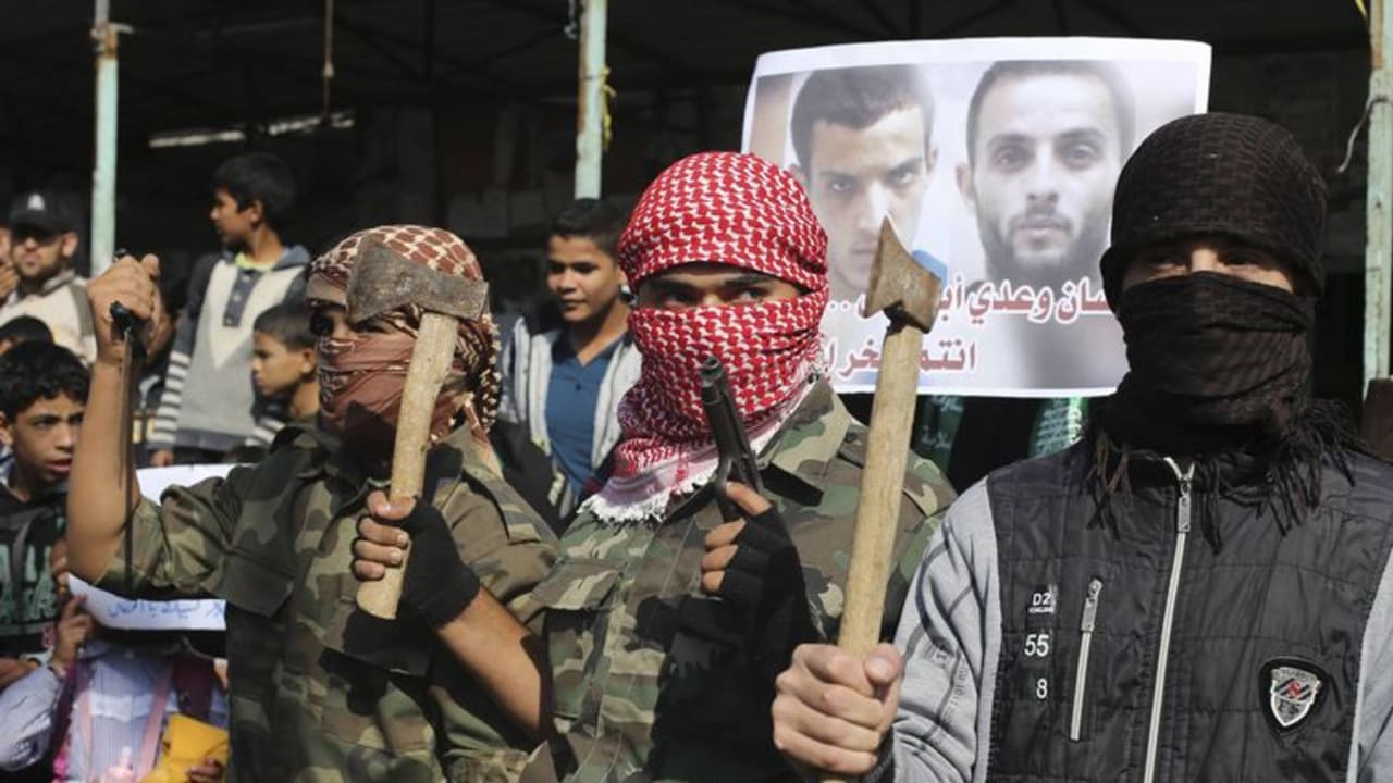 Gazans in Rafah celebrate the attack on a Jerusalem synagogue, November 18, 2014.‏