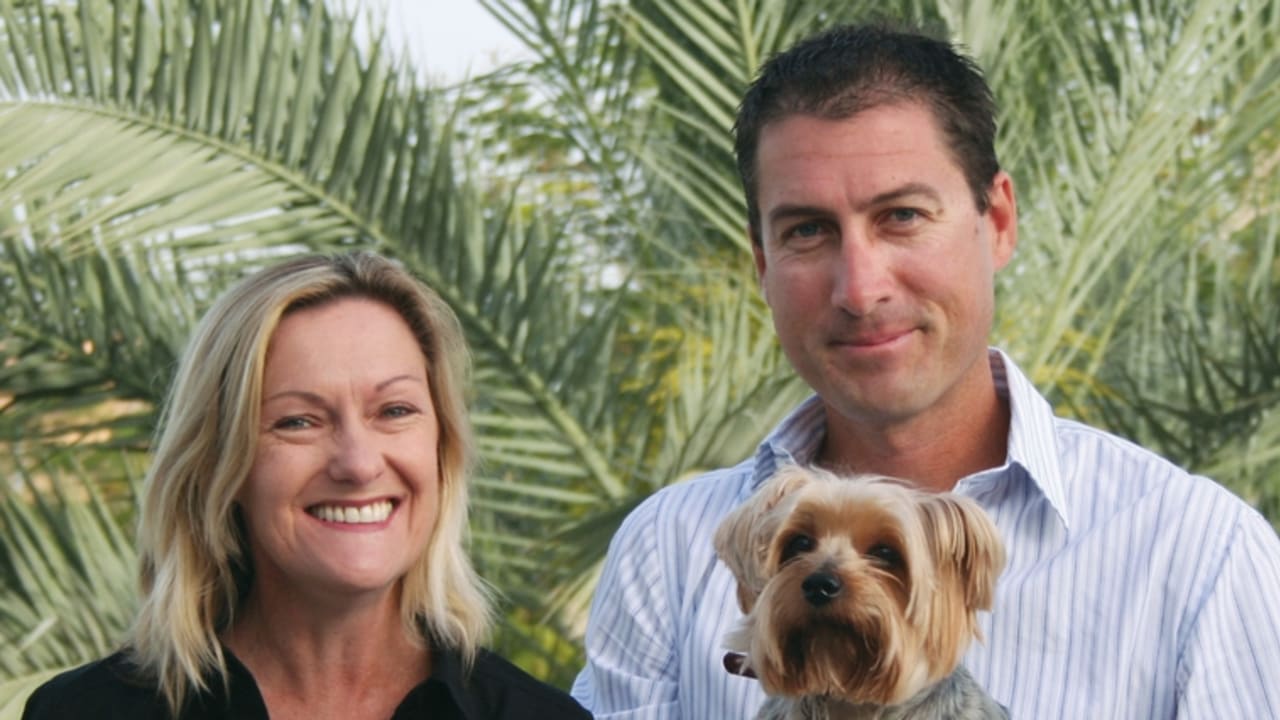Julie and Marcus Lee with their dog.