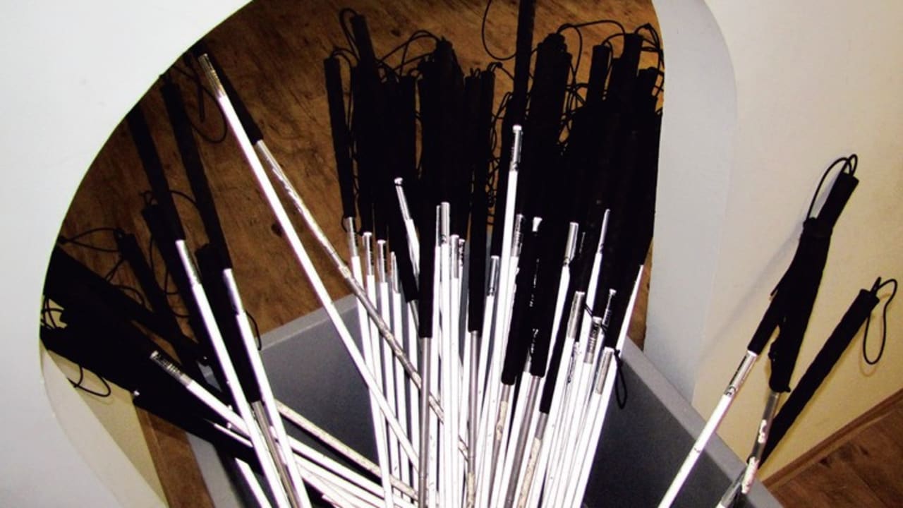 White canes aid those going through the 'Dialogue in the Dark’exhibit