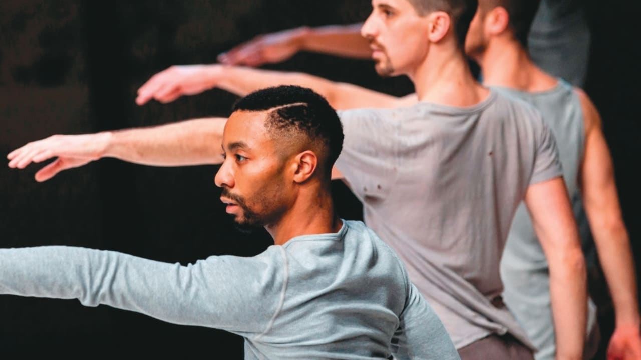 RODERICK GEORGE, foreground, and his troupe in action
