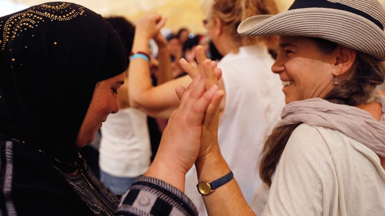A Palestinian woman and an Israeli woman together