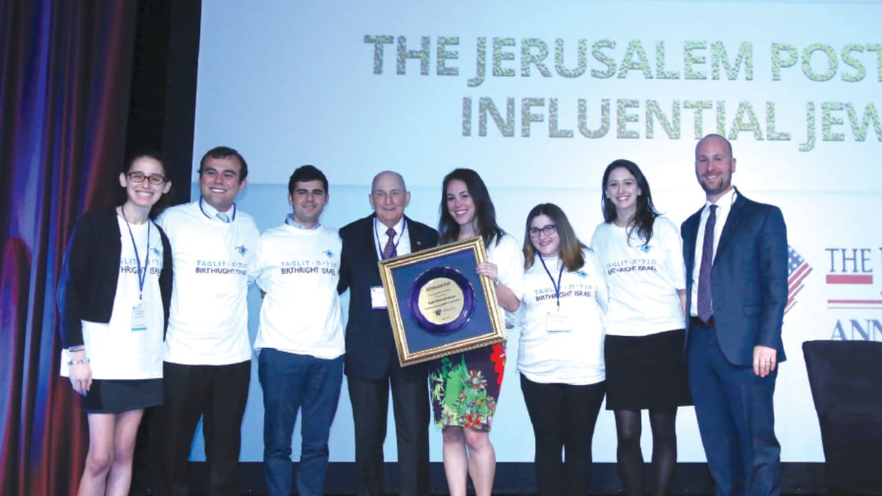 CHARLES BRONFMAN appears on stage with ‘Jerusalem Post’ Editor-in-Chief Yaakov Katz (far right) and Birthright Israel alumni at the paper’s conference in New York on April 29, 2018. The organization was honored for its work in strengthening relations between Diaspora Jewry and Israel