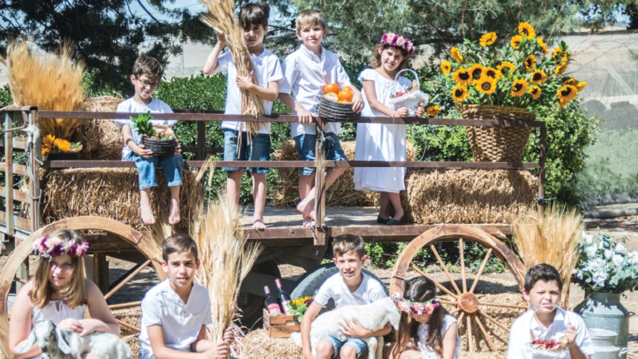 A SHAVUOT parade with first fruits grown at Kibbutz Ramat Rahel