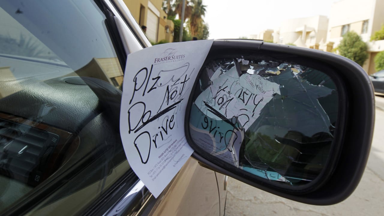 A note placed by an unknown person on female driver Azza Al Shmasani's car, is pictured in Saudi Arabia June 22, 2011. Saudi Arabia has no formal ban on women driving. But as citizens must use only Saudi-issued licences in the country, and as these are issued only to men, women drivers are anathema.