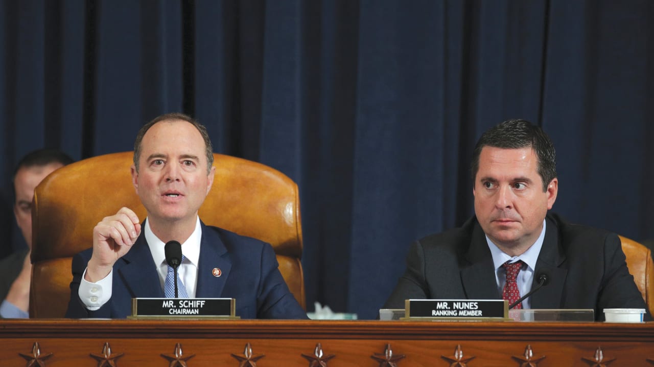 Committee Chairman Adam Schift [L] speaks as ranking member Rep. Devin Nunes [R] listens as former US Ambassador to Ukraine Marie Yovanovitch testifies before the House Intelligence Committee hearing as part of the impeachment inquiry.
