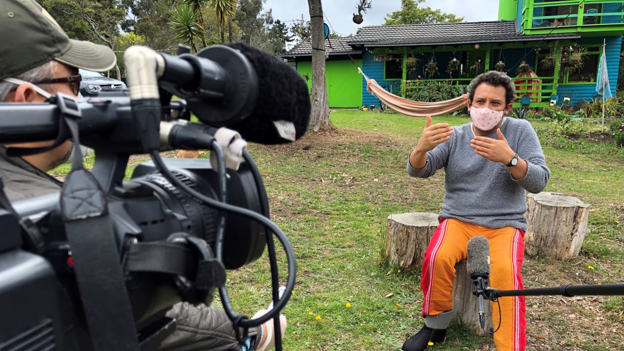 Colombian film director Harold Trompetero, wearing a face mask, speaks during an interview with Reuters, amid the coronavirus disease (COVID-19) outbreak in La Calera, Colombia, May 15, 2020. Picture taken May 15, 2020