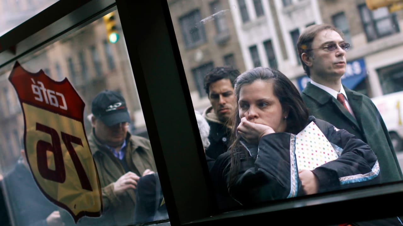 A woman waits in line to enter the UJA-Federation of New York's Connect to Care job fair in New York. 
