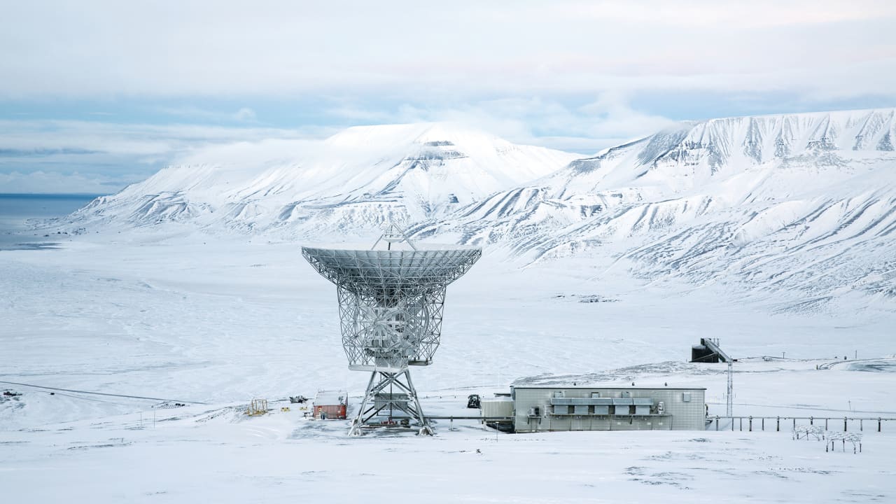A RADAR DISH sits above the European Incoherent Scatter Scientific Association facility in Breinosa, Norway, in 2015. 
