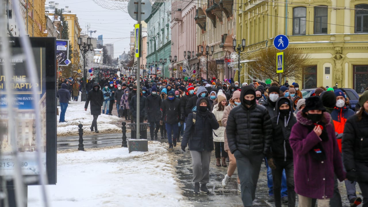 Opposition political leader Alexey Navalny's supporters seen marching in