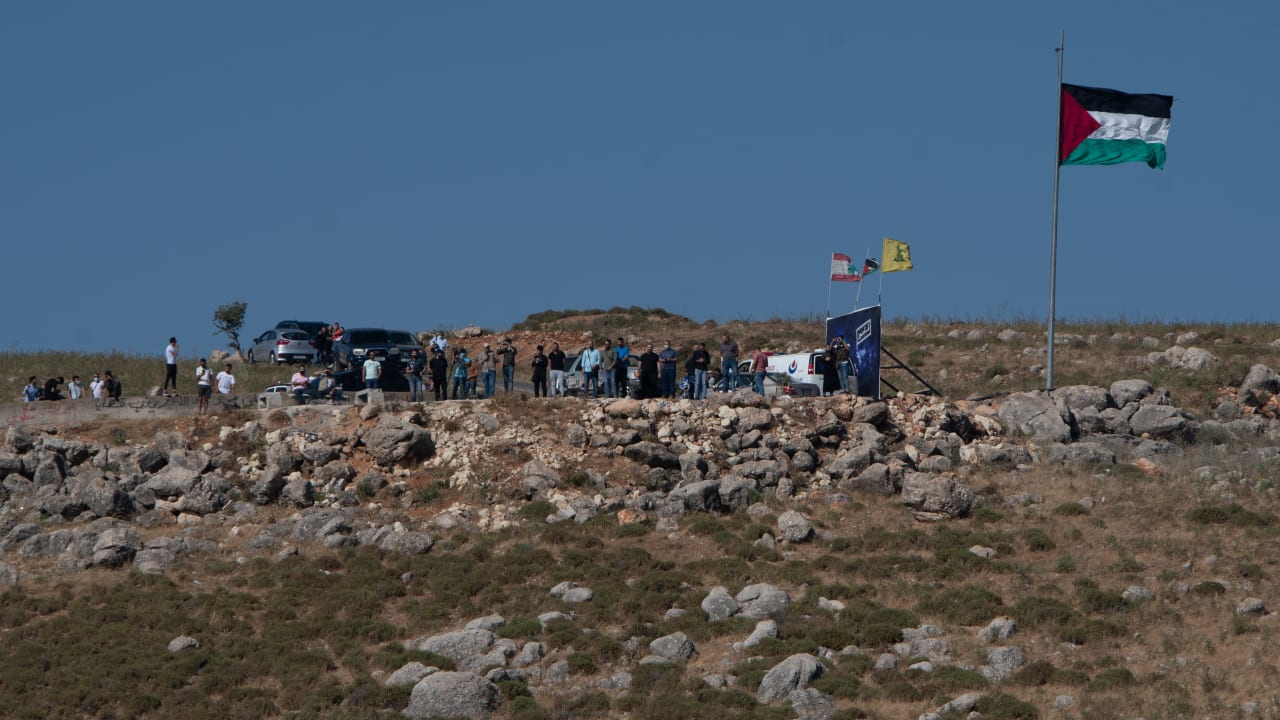 Lebanese protesters seen on the border between Israel and Lebanon, northern Israel, as it seen from Metula, May 15, 2021. 