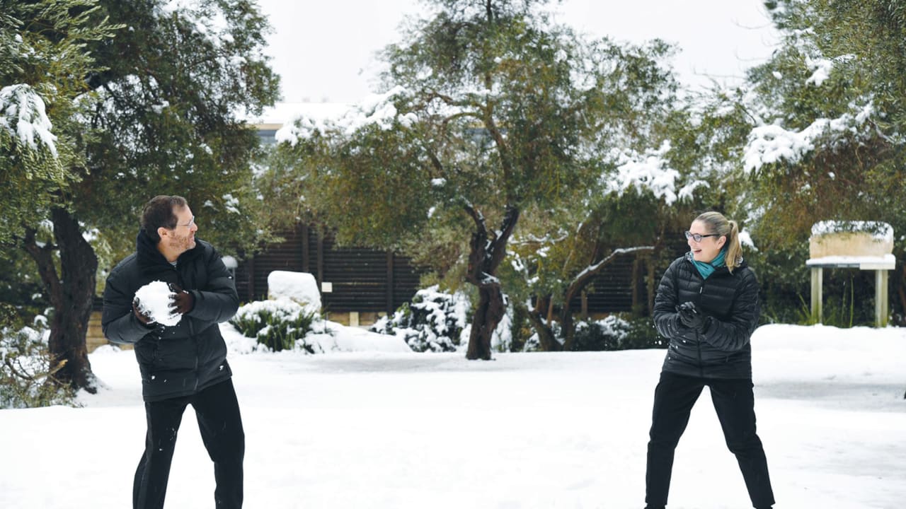  THE HERZOGS throwing snowballs in Jerusalem.
