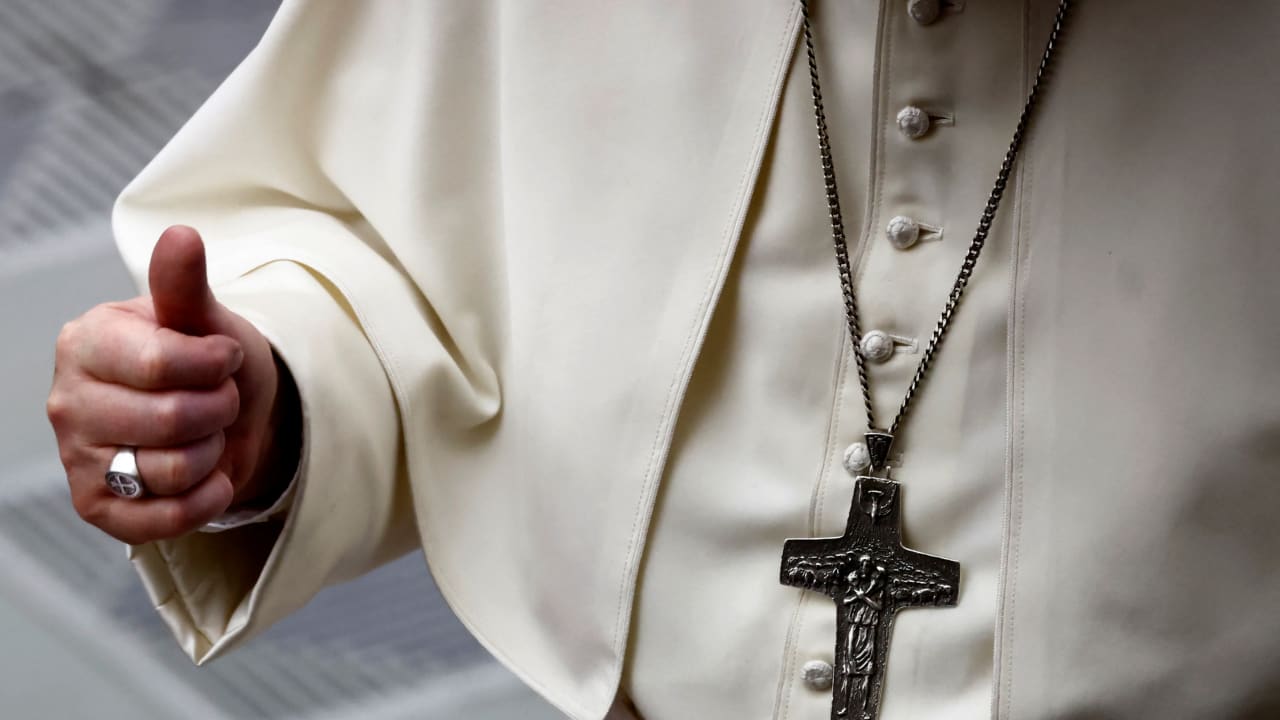  Pope Francis gestures during the weekly general audience at the Paul VI Hall at the Vatican, March 23, 2022. 