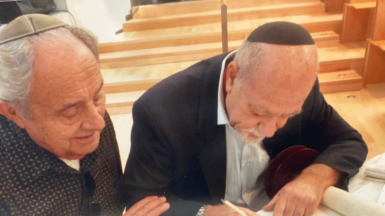  ALEX FOLKMAN (L) at the dedication of a the Sefer Torah at Yad Vashem. R: Rabbi Yitzchak Askof, the sofer.