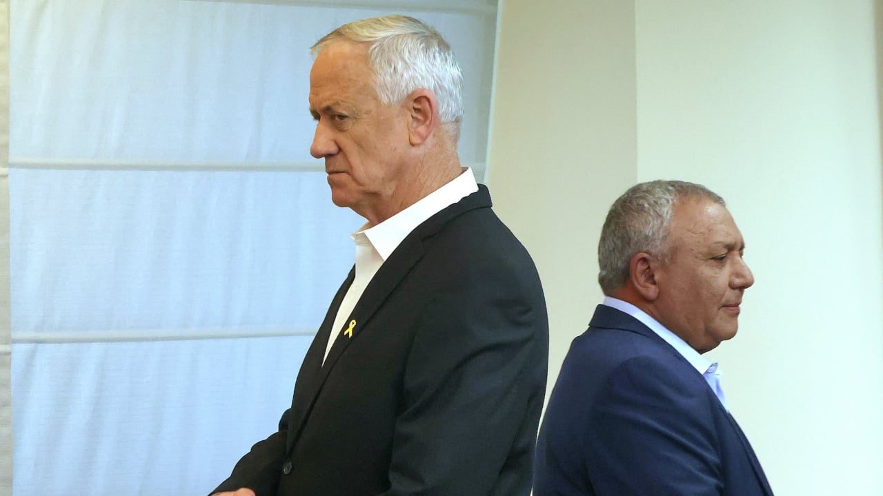  National Unity MKs Benny Gantz and Gadi Eisenkot speak in the Knesset, in Jerusalem, March 24, 2025