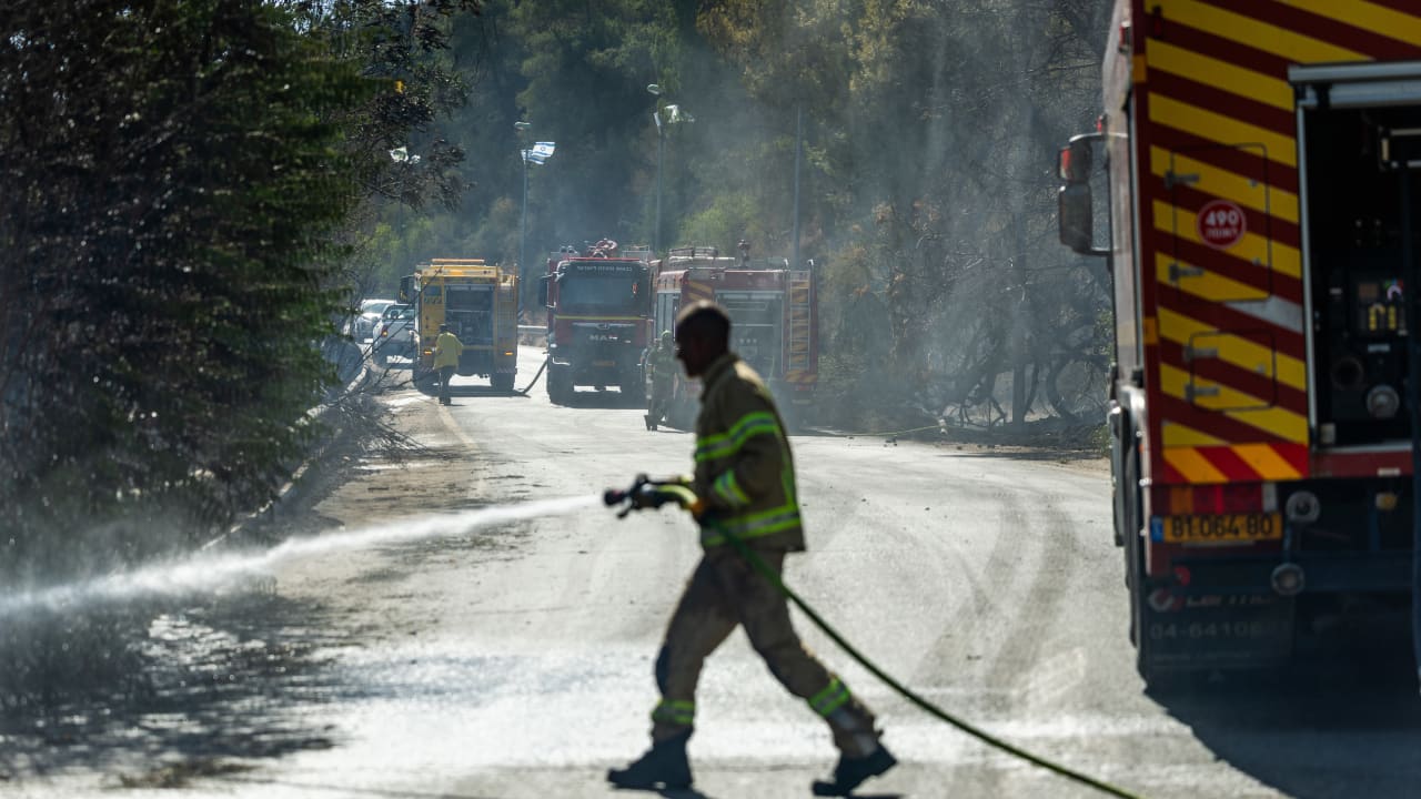 View of a forest fire near Mevaseret Zion, outside Jerusalem on August 24, 2025.