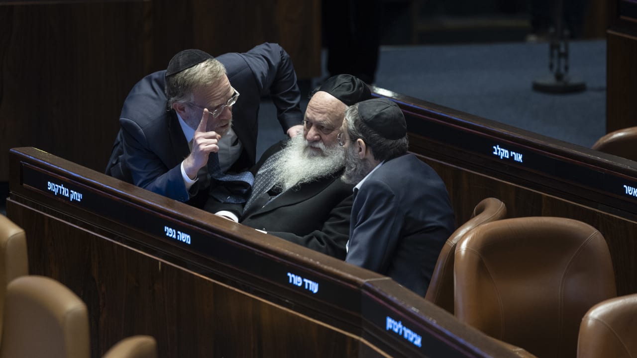 MK's Moshe Gafni and Yitzchak Goldknopf seen during a vote on the state budget at the assembly hall of the Knesset, the Israeli parliament in Jerusalem, January 28, 2026. 